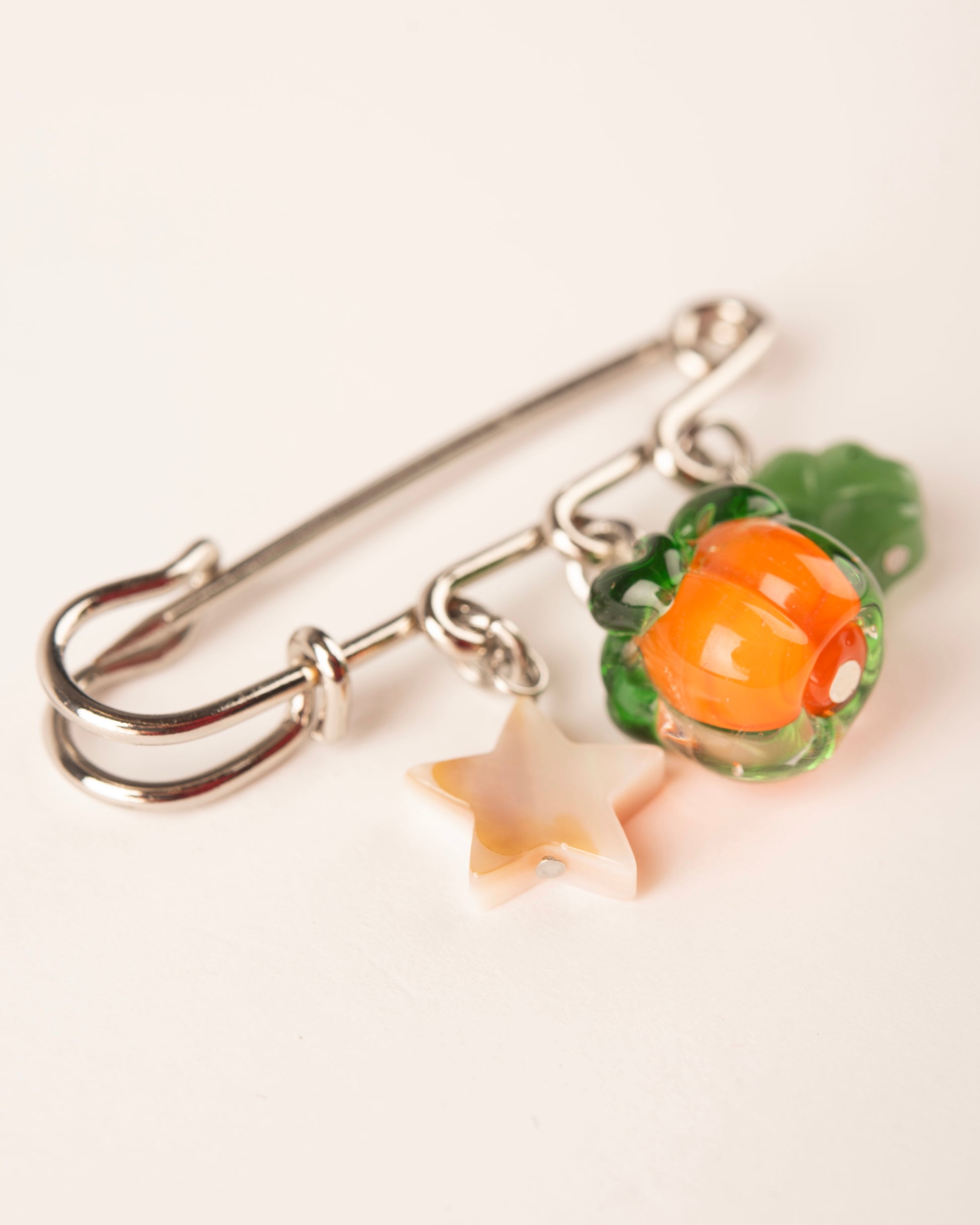 Charm Brooch - Star Shell, Orange, Lucky Clover